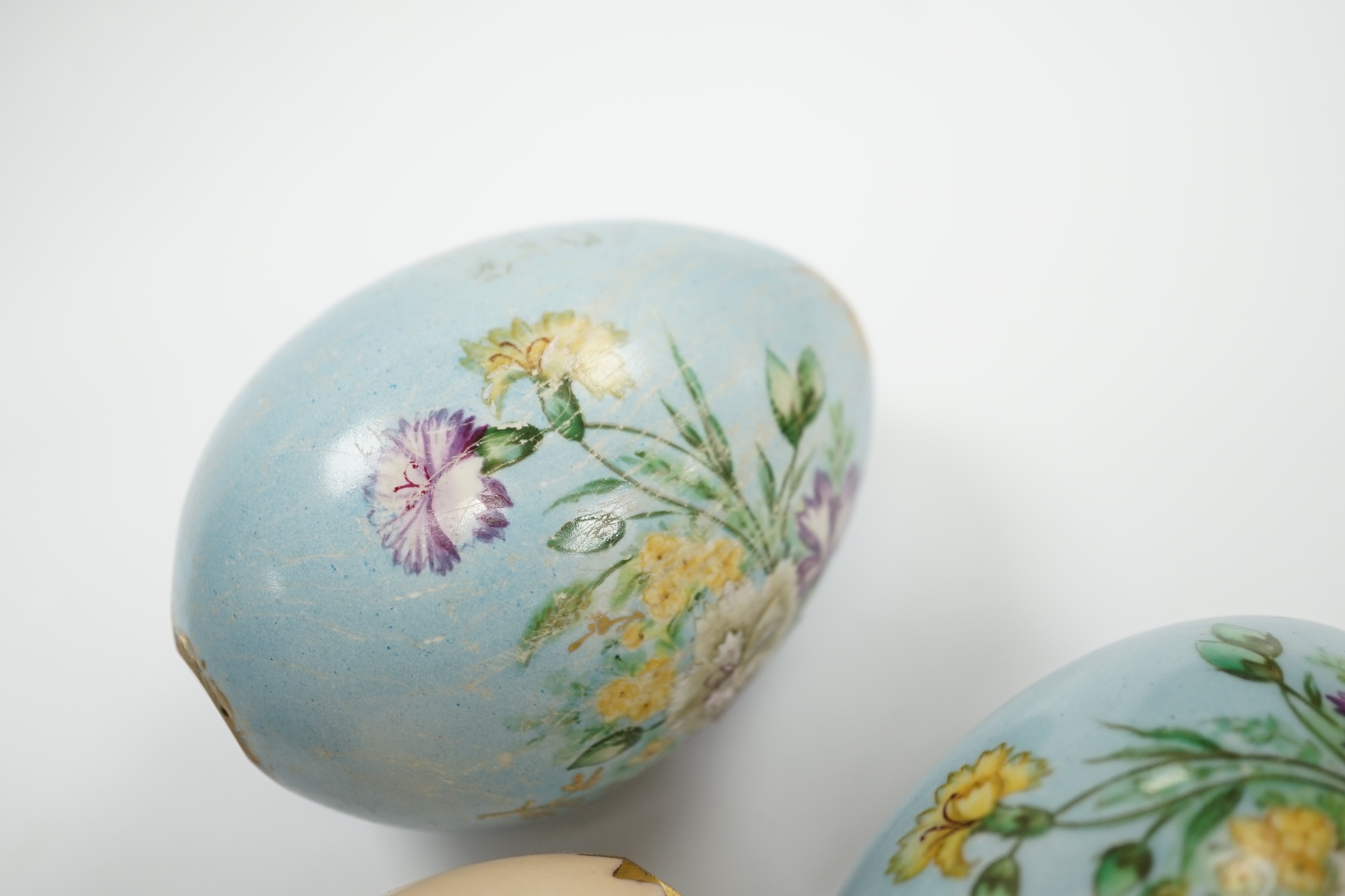 Four Russian porcelain Easter eggs, 19th century, 11cm high